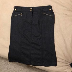 Express 56% wool knee length skirt.